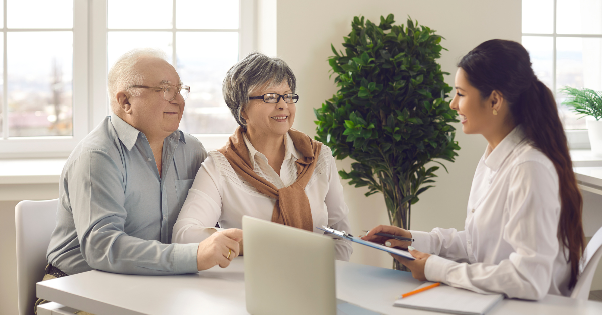 A couple in a meeting about retirement